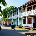 수리남과 프랑스령 기아나의 차이 - Photorealistic street scene in Paramaribo, Suriname, elegant weathered Dutch colonial wooden houses ...